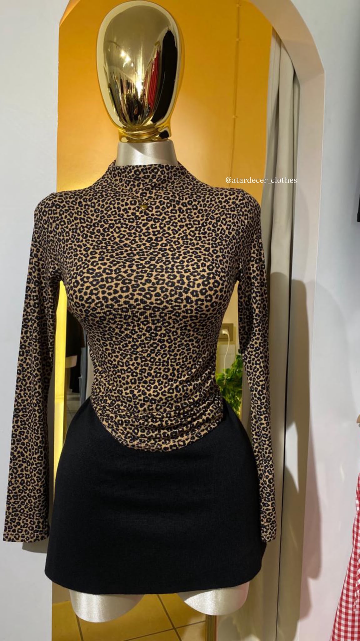 Blusa Manga Larga Animal Print Cuello Alto