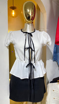Blusa blanca con moños